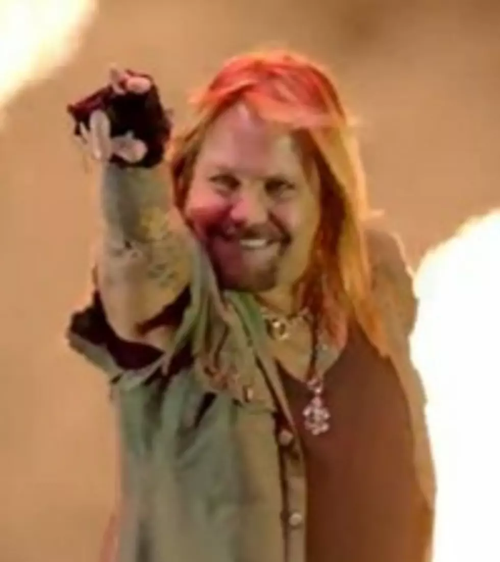 Vince Neil Tries to Punch Fan During Show (VIDEO)