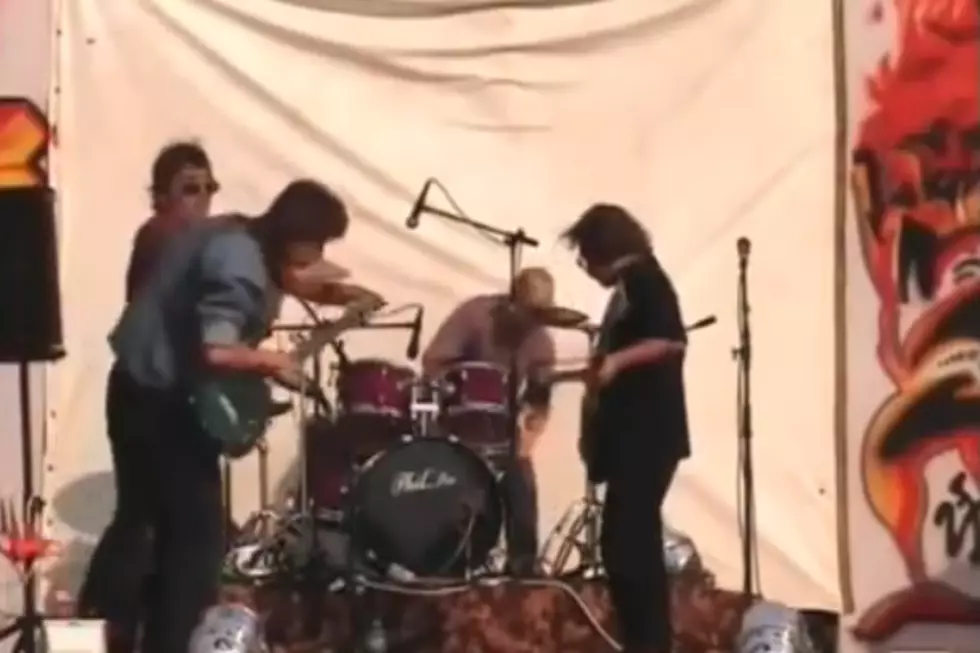 Band Members Slap Horrible Guitarist Mid Song [Watch]