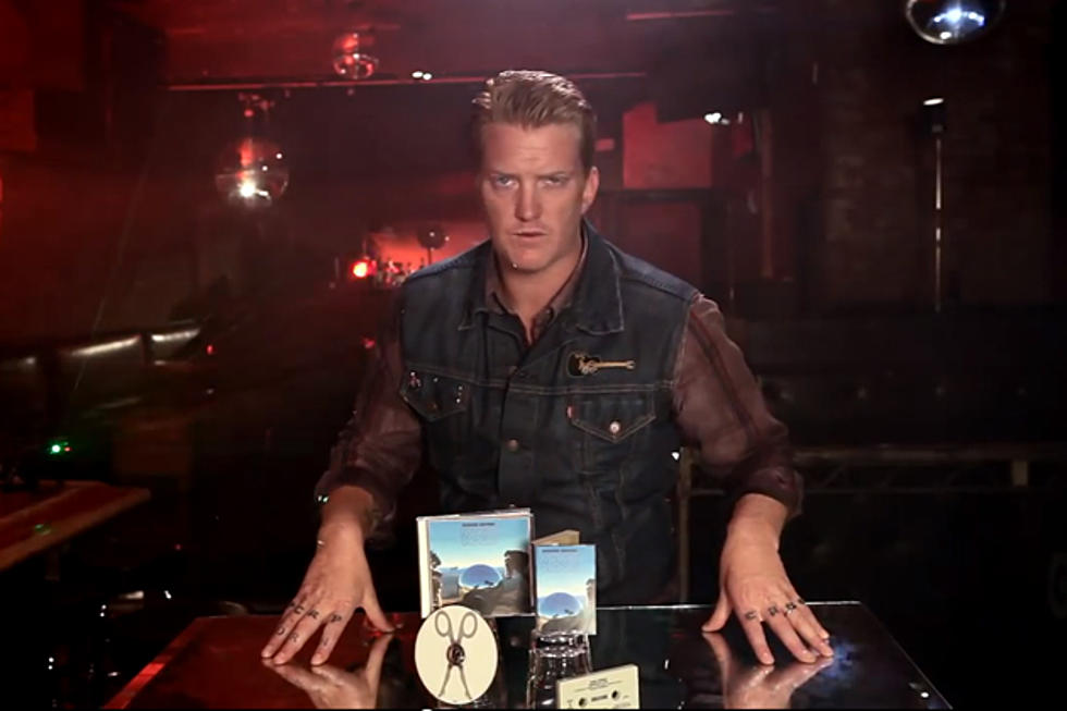 Flashback: Queens of the Stone Age’s Joshua Homme Becomes Awkward Pitchman [Watch]